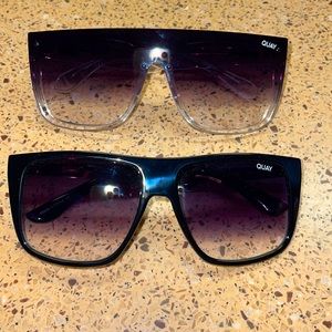 Jaded and incognito Quay sunglasses.